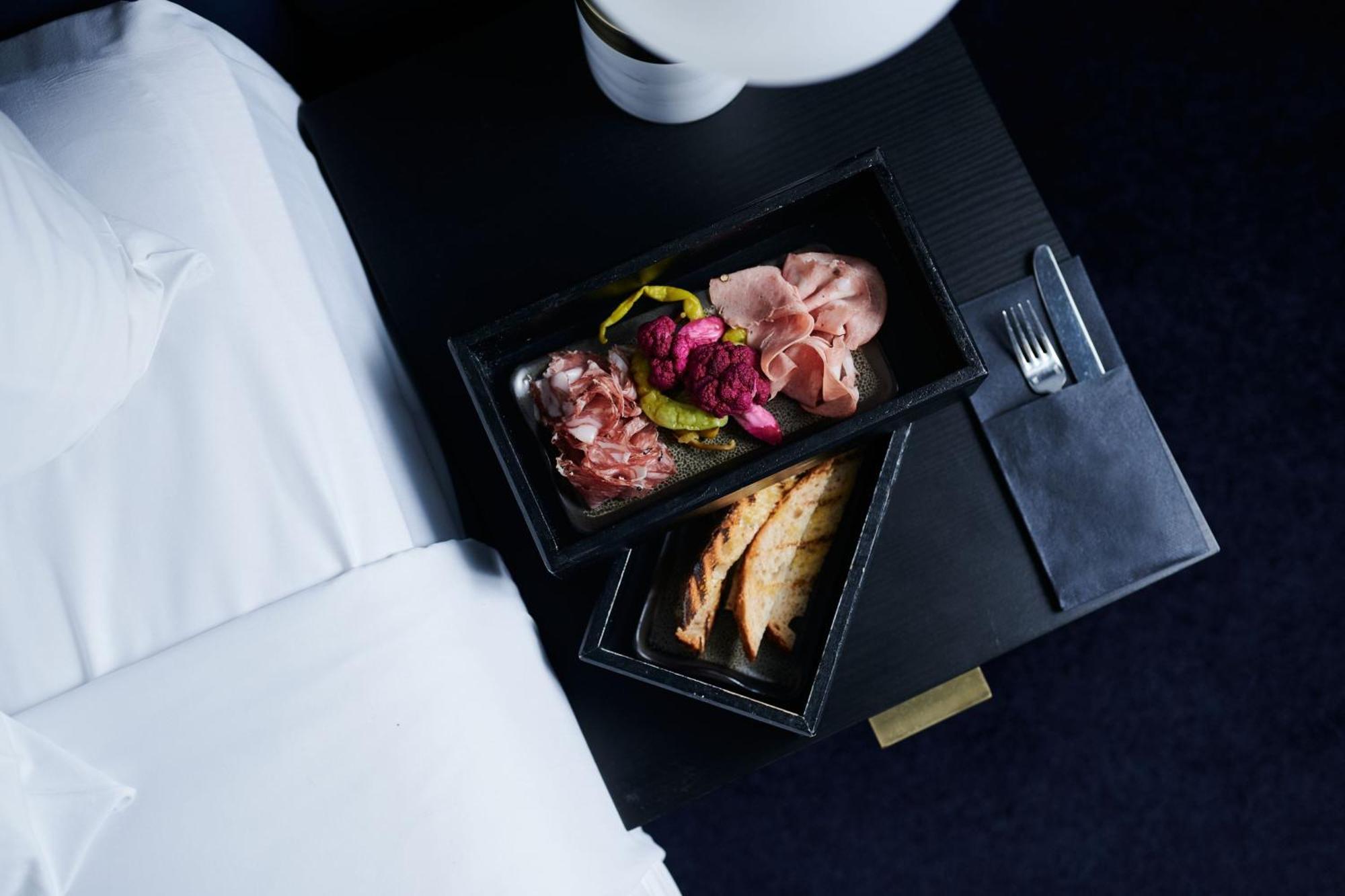 Midnight Hotel, Autograph Collection Canberra Extérieur photo A first-class meal on board a Lufthansa plane